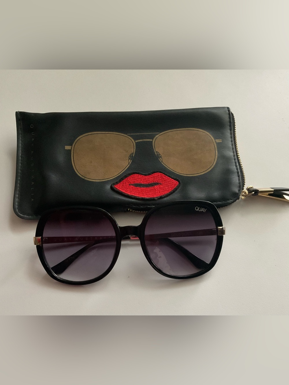 Quay Australia Black Round Sunglasses with Purple Lenses and Black Lip Pouch